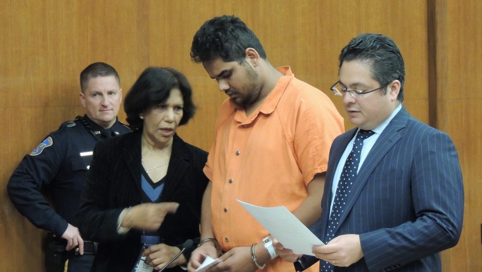 defendant Simranjeet Sing Sandhu, defense attorney S. Emile Lisboa