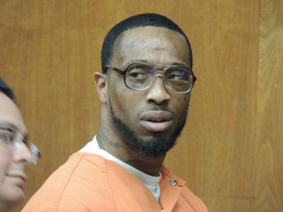 Jamaine Cole of Englewood flinches when he hears a plea offer for 15 years